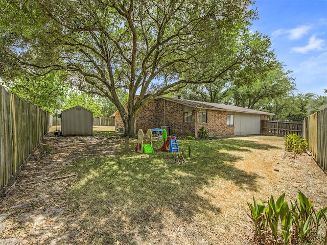 view of yard with a storage shed