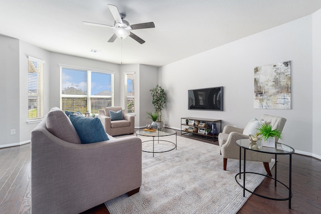 living room with hardwood / wood-style floors and ceiling fan