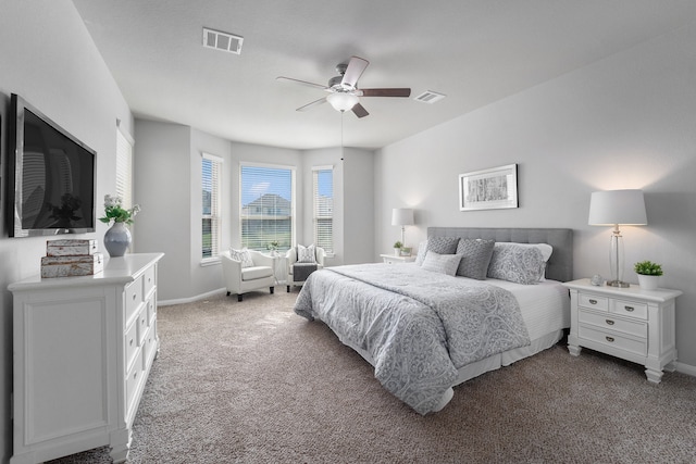 bedroom featuring ceiling fan and light carpet