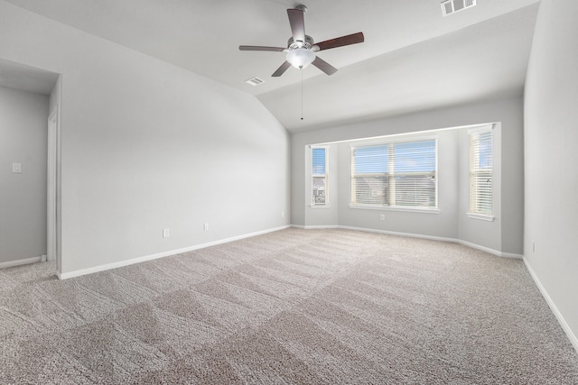 unfurnished room with carpet flooring, ceiling fan, and lofted ceiling