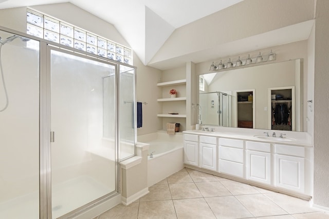 bathroom featuring separate shower and tub, tile patterned floors, vanity, and lofted ceiling