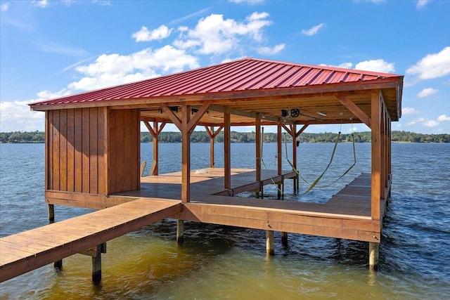 view of dock with a water view