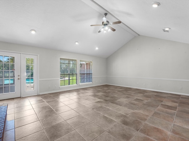 empty room featuring tile patterned floors, lofted ceiling with beams, ceiling fan, and french doors