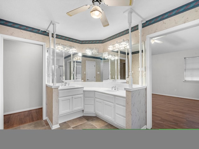 bathroom with hardwood / wood-style floors and vanity