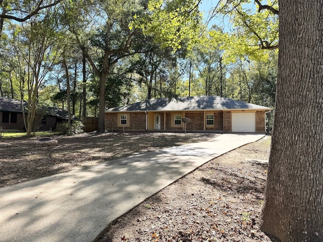 ranch-style home with a garage