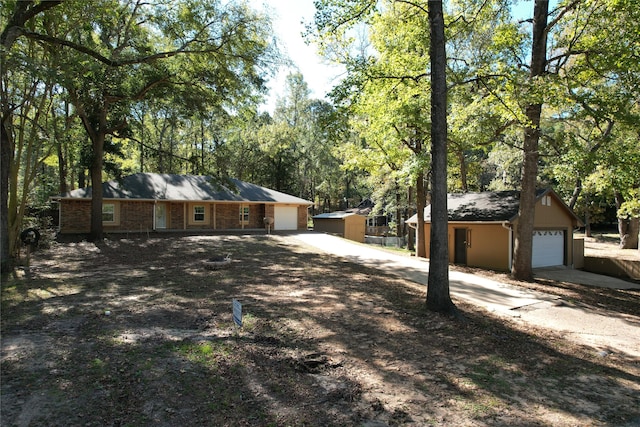 view of side of property with a garage