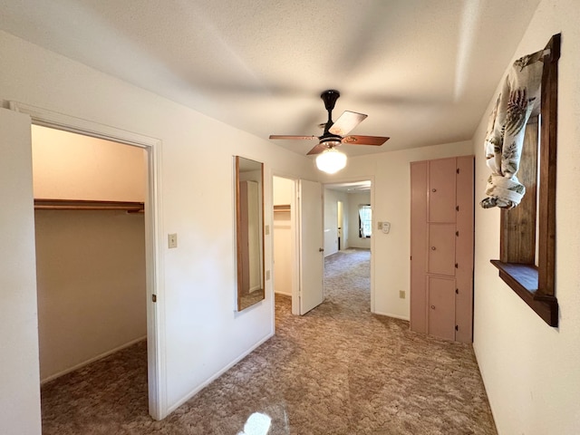hallway featuring carpet floors