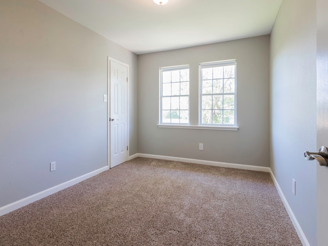 view of carpeted spare room