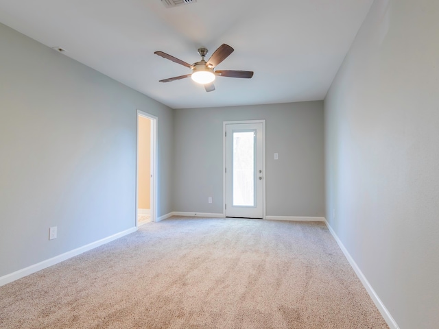 carpeted empty room with ceiling fan