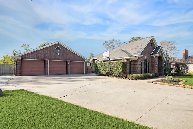 view of property exterior with a garage