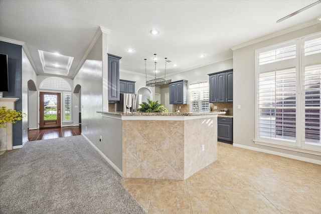 kitchen with decorative backsplash, ornamental molding, gray cabinetry, light tile patterned floors, and stainless steel fridge with ice dispenser