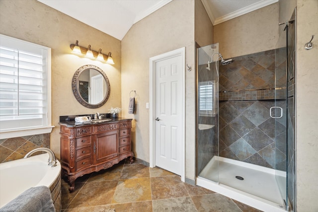 bathroom with plus walk in shower, vanity, lofted ceiling, and crown molding