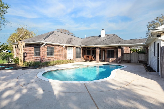 view of pool featuring a patio