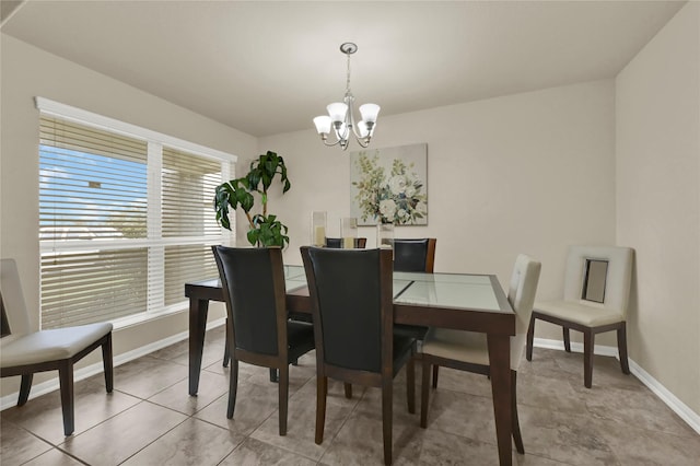 dining space featuring a chandelier