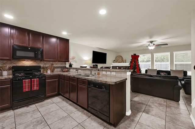 kitchen with kitchen peninsula, ceiling fan, sink, black appliances, and light tile patterned floors