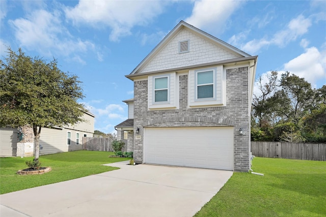 view of front of home featuring a front yard and a garage