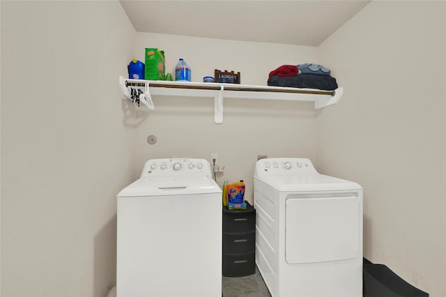 laundry area with separate washer and dryer