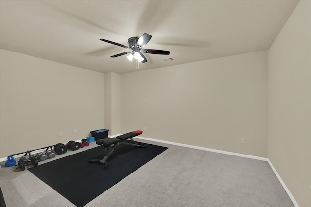 exercise room featuring carpet and ceiling fan