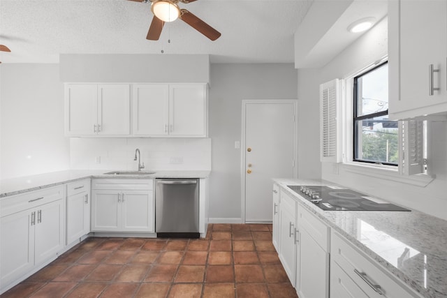 kitchen with dishwasher, white cabinets, sink, black electric cooktop, and a textured ceiling