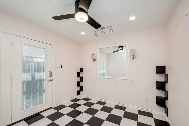 entrance foyer featuring tile patterned floors, baseboards, ceiling fan, and recessed lighting