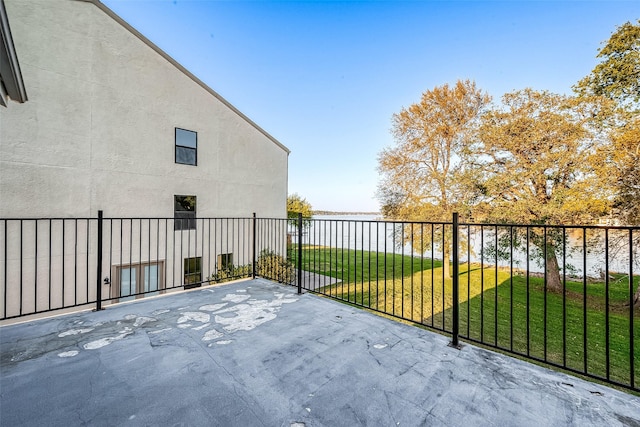 view of patio featuring a water view