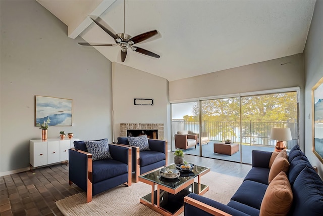 living room featuring beam ceiling, a fireplace, ceiling fan, wood finished floors, and high vaulted ceiling