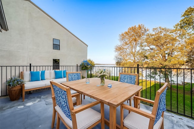 view of patio / terrace featuring outdoor dining space and an outdoor living space