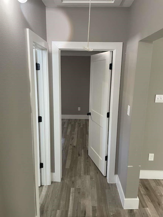 hallway featuring hardwood / wood-style floors