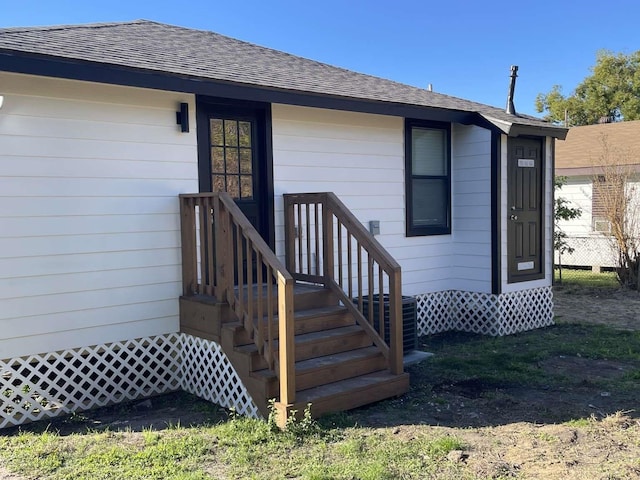 doorway to property with cooling unit