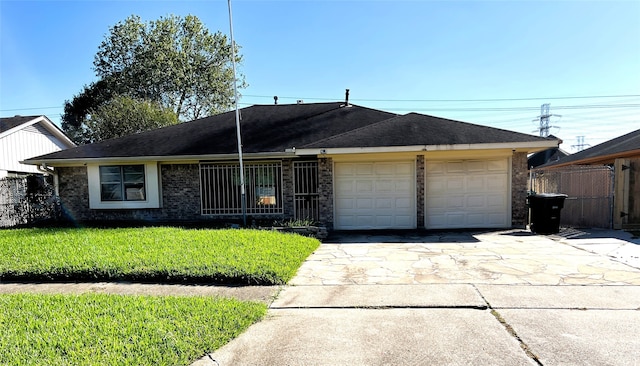 single story home with a front yard and a garage