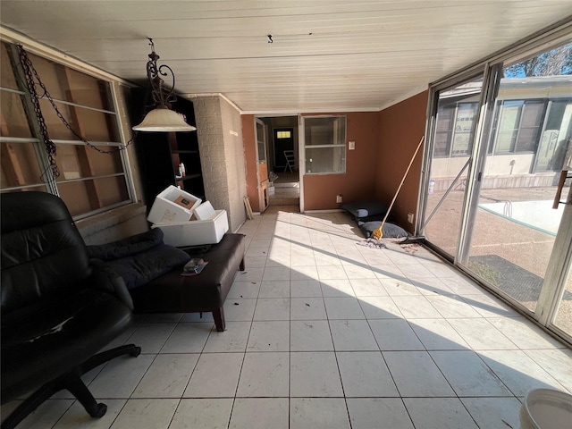 unfurnished sunroom featuring plenty of natural light and wooden ceiling