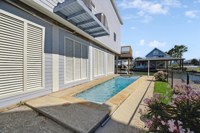 view of swimming pool featuring a patio