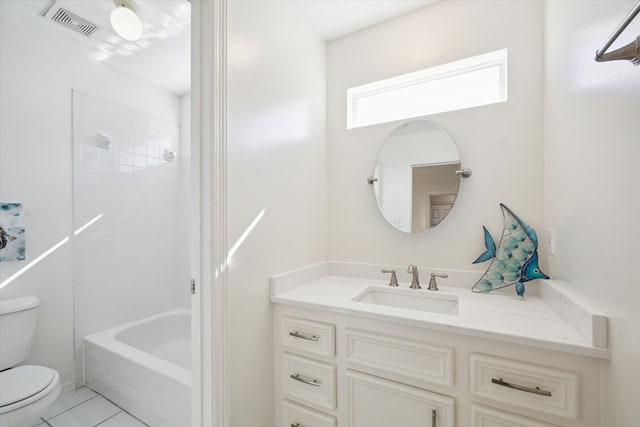 full bathroom with tile patterned floors, vanity, shower / bathtub combination, and toilet