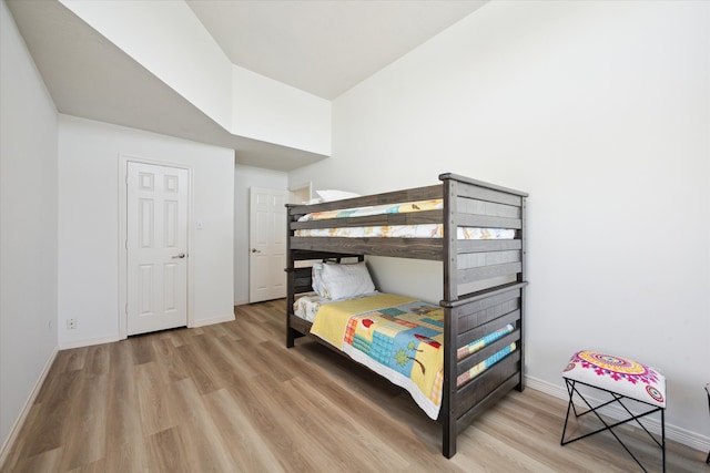 bedroom with light hardwood / wood-style flooring