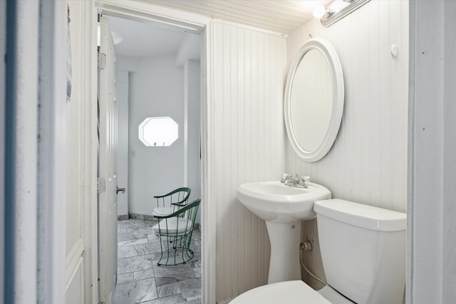 bathroom with sink and toilet