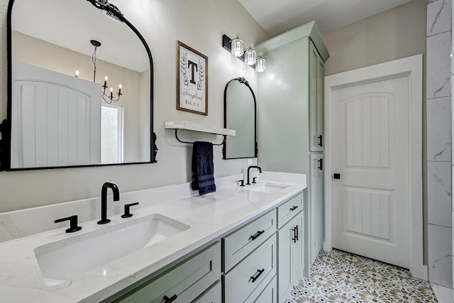 bathroom with vanity and a notable chandelier