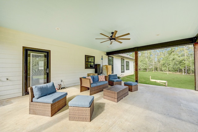 view of patio with outdoor lounge area and ceiling fan