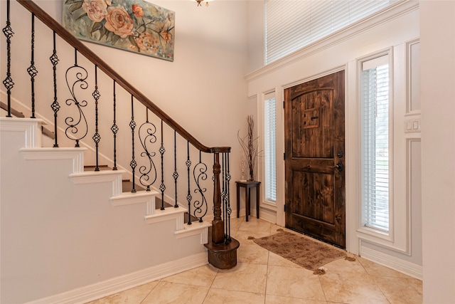 foyer with light tile patterned floors