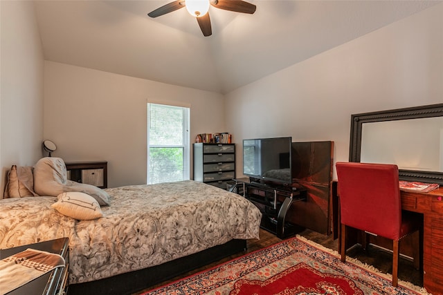 bedroom with ceiling fan and vaulted ceiling