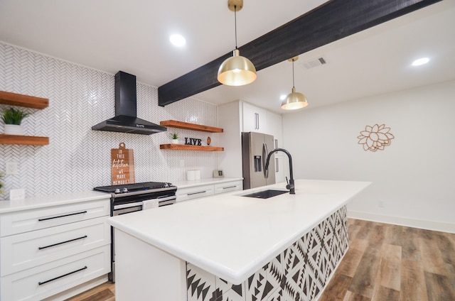 kitchen featuring white cabinetry, wall chimney exhaust hood, stainless steel fridge with ice dispenser, pendant lighting, and light hardwood / wood-style floors