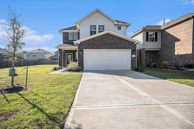 view of property with a front lawn and a garage