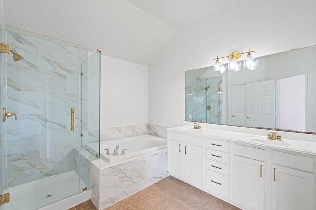 bathroom with tile patterned flooring, vanity, lofted ceiling, and shower with separate bathtub