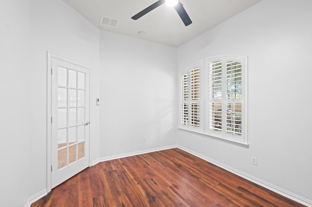 unfurnished room with hardwood / wood-style flooring and ceiling fan