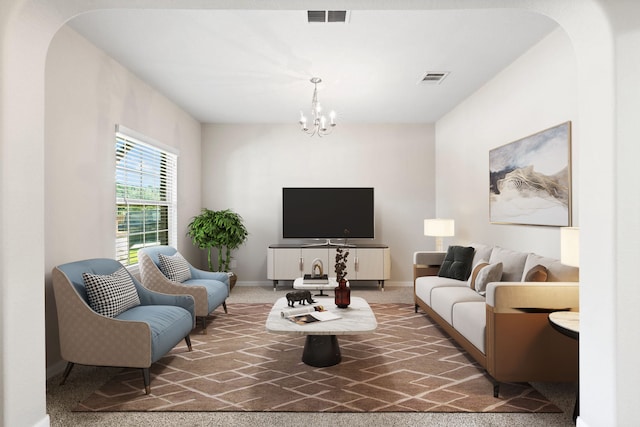 carpeted living room featuring a notable chandelier