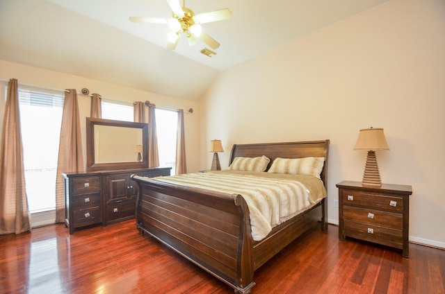 bedroom featuring lofted ceiling, ceiling fan, and dark hardwood / wood-style floors