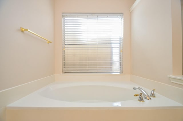 bathroom with a washtub