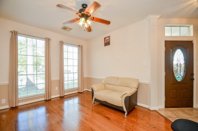 foyer entrance featuring ceiling fan, plenty of natural light, and hardwood / wood-style floors