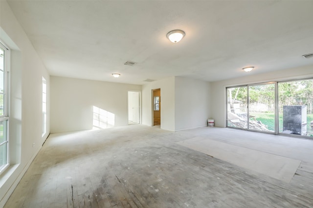 spare room featuring light hardwood / wood-style floors