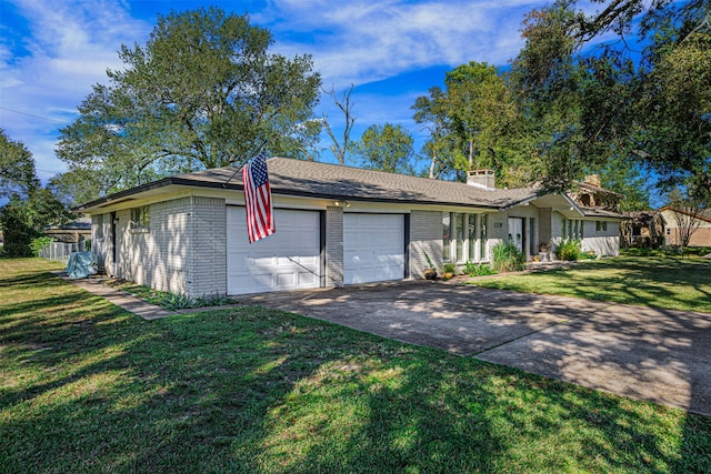 single story home featuring a garage and a front lawn