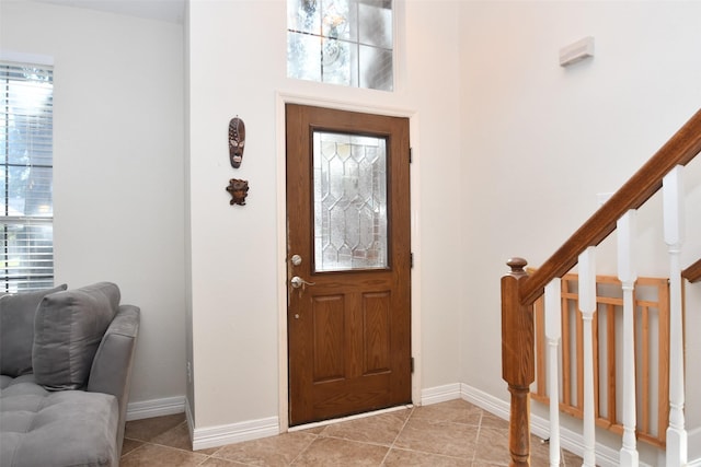 entryway featuring light tile patterned floors